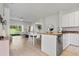 Bright living area with modern kitchen, dining area, and view to the backyard at 2742 Sun Key Pl, Kissimmee, FL 34747