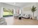 Inviting living area with stylish decor, comfortable seating, and a view of the outdoors at 2742 Sun Key Pl, Kissimmee, FL 34747