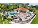 Resort-style pool featuring a large pool deck with plenty of lounge chairs, picnic area and bar area at 2742 Sun Key Pl, Kissimmee, FL 34747