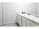 Bright bathroom showcasing a double sink vanity and stylish countertops at 2752 Grand Central Ave, Tavares, FL 32778