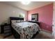 Comfortable bedroom with a stylish bed, coordinating decor, and natural light at 2752 Grand Central Ave, Tavares, FL 32778
