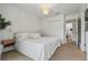 Bright main bedroom with white linens and adjacent closet at 2756 Sun Key Pl, Kissimmee, FL 34747