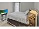 Cozy bedroom features a comfortable bed and modern entertainment with a TV at 2776 Joseph Cir, Oviedo, FL 32765