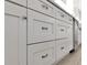 White kitchen cabinets with sleek, modern hardware at 2776 Joseph Cir, Oviedo, FL 32765