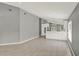 Spacious open-concept living room with bright kitchen and dining in background at 2776 Joseph Cir, Oviedo, FL 32765