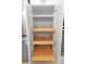 White pantry with pull-out wood drawers for ample kitchen storage at 2776 Joseph Cir, Oviedo, FL 32765