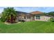 Spacious backyard with a screened-in pool and patio area for outdoor enjoyment at 2801 Boat Cove Cir, Kissimmee, FL 34746
