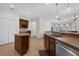 Bright kitchen with stainless steel appliances with an open floor plan at 2801 Boat Cove Cir, Kissimmee, FL 34746
