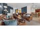Spacious living room with comfortable seating, carpet flooring, and an open floor plan for a bright and inviting atmosphere at 2801 Boat Cove Cir, Kissimmee, FL 34746