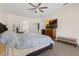 Spacious main bedroom with carpet flooring and a ceiling fan at 2801 Boat Cove Cir, Kissimmee, FL 34746