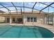 Inviting pool with an expansive patio area perfect for outdoor entertaining and relaxation, featuring a screened enclosure at 2801 Boat Cove Cir, Kissimmee, FL 34746