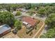 Aerial shot of the property displaying the backyard, patio area, and the homes convenient location within the community at 2933 N Chickasaw Trl, Orlando, FL 32817