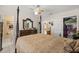 Inviting bedroom featuring a poster bed, coordinating furniture, and ample space at 2933 N Chickasaw Trl, Orlando, FL 32817