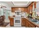 Open kitchen layout with modern appliances and efficient design at 2933 N Chickasaw Trl, Orlando, FL 32817