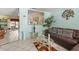 Bright living room showcasing tile floors and decorative accents at 2933 N Chickasaw Trl, Orlando, FL 32817