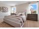 Inviting primary bedroom filled with natural light, offering a peaceful escape at 3635 Fort Mellon Ln, Sanford, FL 32773