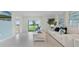 Inviting living room with coastal-inspired decor, a view of the outdoor landscape, and an open layout at 3665 Marlberry Way, Sanford, FL 32773