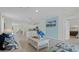 Spacious living room with blue accent wall and a view of the open floor plan and modern decor at 3665 Marlberry Way, Sanford, FL 32773