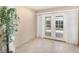 Open foyer area leading to the backyard pool with tile flooring at 400 Bridge Creek Blvd, Ocoee, FL 34761