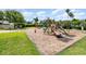 Community playground featuring slides and swings, ideal for recreation at 400 Bridge Creek Blvd, Ocoee, FL 34761