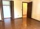 Comfortable bedroom with tile floors, closet with folding doors, and neutral decor at 4105 Quando Dr, Belle Isle, FL 32812