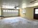 Spacious garage with an automatic door, utility sink, and plenty of room for storage and vehicles at 4105 Quando Dr, Belle Isle, FL 32812