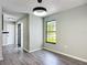 This dining room boasts hard surface floors, neutral paint, and a window at 43 Lake Court Loop, Ocala, FL 34472
