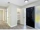 This entryway offers hard surface floors, neutral paint, and a view to another room at 43 Lake Court Loop, Ocala, FL 34472
