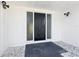 Front door featuring white trim and decorative rocks at 43 Lake Court Loop, Ocala, FL 34472