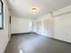 Spacious garage with gray floor, white walls, and built in storage at 43 Lake Court Loop, Ocala, FL 34472