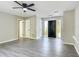 This living room offers hard surface floors, neutral paint, and a front door at 43 Lake Court Loop, Ocala, FL 34472