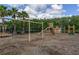 Community playground featuring swings, a slide, and climbing structures for enjoyment at 4313 Gumbo Limbo Dr, Orlando, FL 32822