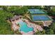 Aerial view of community pool, tennis courts, and basketball court at 4520 Barrister Dr, Clermont, FL 34711
