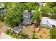 Aerial view of home, lush backyard, a detached garage and neighboring properties at 490 Shoreview Ave, Winter Park, FL 32789