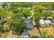 Aerial view of home, lush backyard, a detached garage and neighboring properties at 490 Shoreview Ave, Winter Park, FL 32789