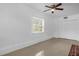 Bedroom with tile floors, ceiling fan, closet space, and lots of natural light at 490 Shoreview Ave, Winter Park, FL 32789