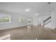 Bright living room area featuring tile floors, natural light, and access to outdoor space at 490 Shoreview Ave, Winter Park, FL 32789