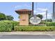 Entrance to Fountain Parke at Lake Mary featuring a tiled entrance and manicured landscaping at 524 Lobelia Dr, Lake Mary, FL 32746