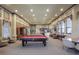 Bright game room featuring a pool table, seating areas, and ample natural light at 524 Lobelia Dr, Lake Mary, FL 32746