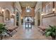 Elegant lobby with high ceilings, chandeliers, and tiled floor at 524 Lobelia Dr, Lake Mary, FL 32746