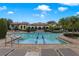 Resort-style pool with tanning ledges and lounge chairs at 524 Lobelia Dr, Lake Mary, FL 32746