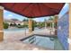 Community pool area featuring a hot tub under a gazebo with a tiled fountain feature along the wall at 524 Lobelia Dr, Lake Mary, FL 32746