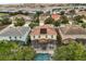 Residential neighborhood featuring terra cotta roofs, manicured lawns, and mature landscaping at 5353 Oakbourne Ave, Davenport, FL 33837