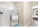 Bathroom showcasing glass enclosed shower, soft towel accents, and well-lit space at 5353 Oakbourne Ave, Davenport, FL 33837