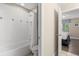 Bathroom with shower/tub combination is accessible from the hallway or bedroom at 5353 Oakbourne Ave, Davenport, FL 33837