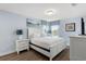 Comfortable bedroom featuring a king bed, contemporary decor and a bright, inviting atmosphere at 5353 Oakbourne Ave, Davenport, FL 33837