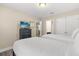This bedroom features 2 twin beds and a flatscreen TV at 5353 Oakbourne Ave, Davenport, FL 33837