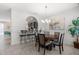Dining area open to the kitchen includes a table for six and bar seating at 5353 Oakbourne Ave, Davenport, FL 33837