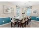 Bright dining room features modern decor, stylish lighting, and comfortable seating for a delightful dining experience at 5353 Oakbourne Ave, Davenport, FL 33837