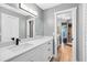 Modern bathroom with dual sinks, updated fixtures, and stylish design providing a luxurious feel at 5370 Whispering Pine Cir, St Cloud, FL 34771